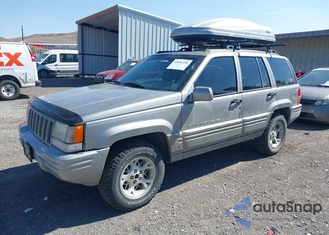 1997 Jeep Grand Cherokee Limited из США, поврежденный, VIN 1J4GZ78Y8VC714904
